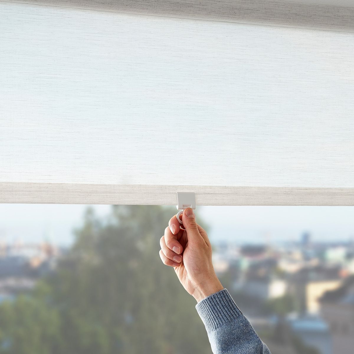 Professional curtains and blinds installation Dubai window treatment experts measuring